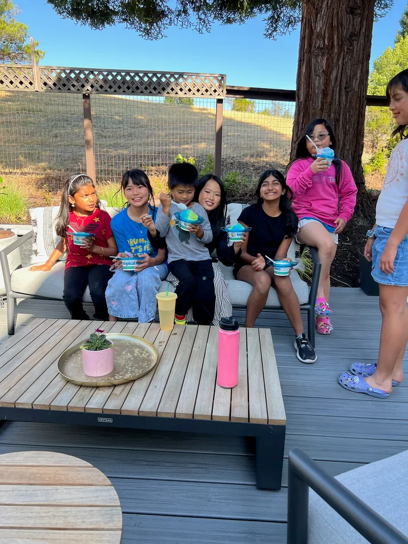 Kids enjoying Hawaiian shave ice at a Bay Area birthday party